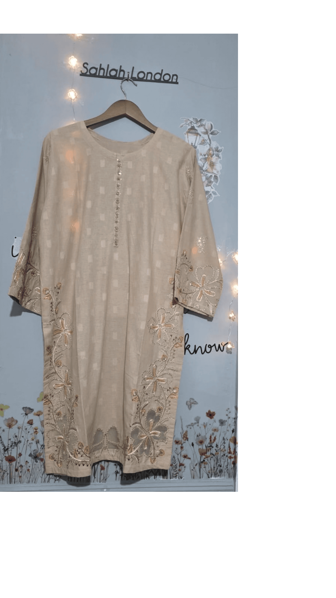 Elegant Beige Dress with Motives 