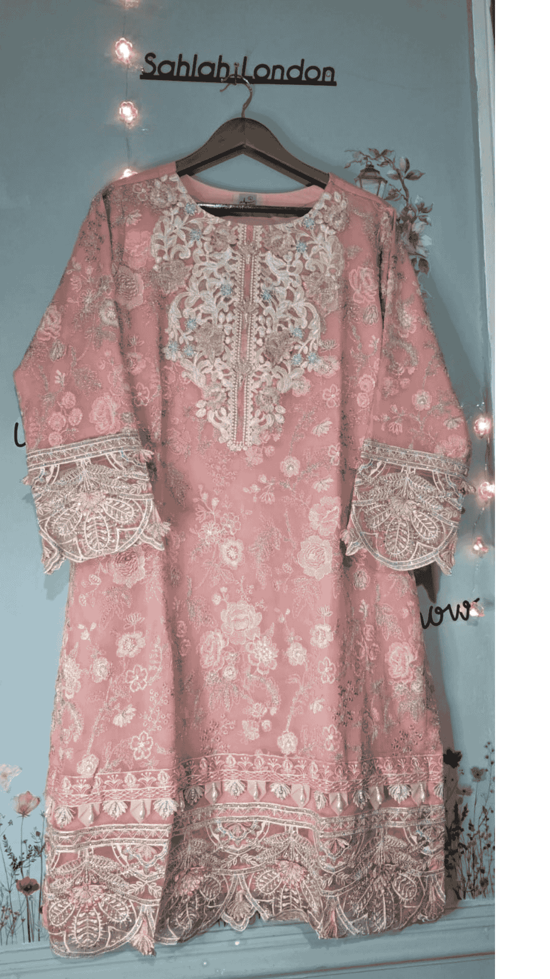 Elegant Embroidered Dress with Lace Details and Floral Patterns